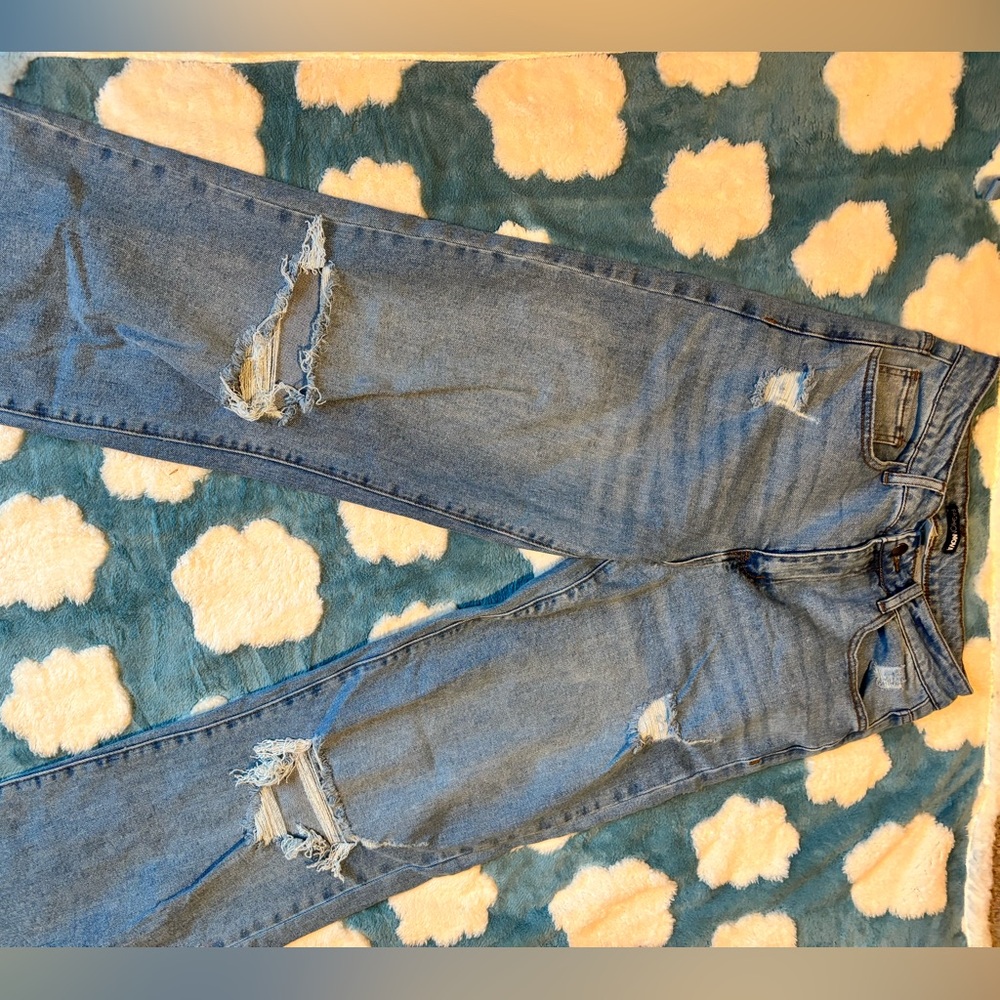 Distressed Blue Jeans